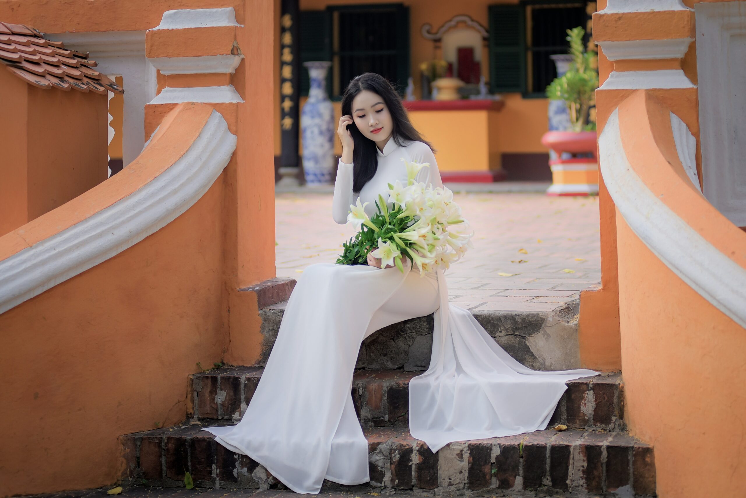 Two different brides showcasing unique updo styles