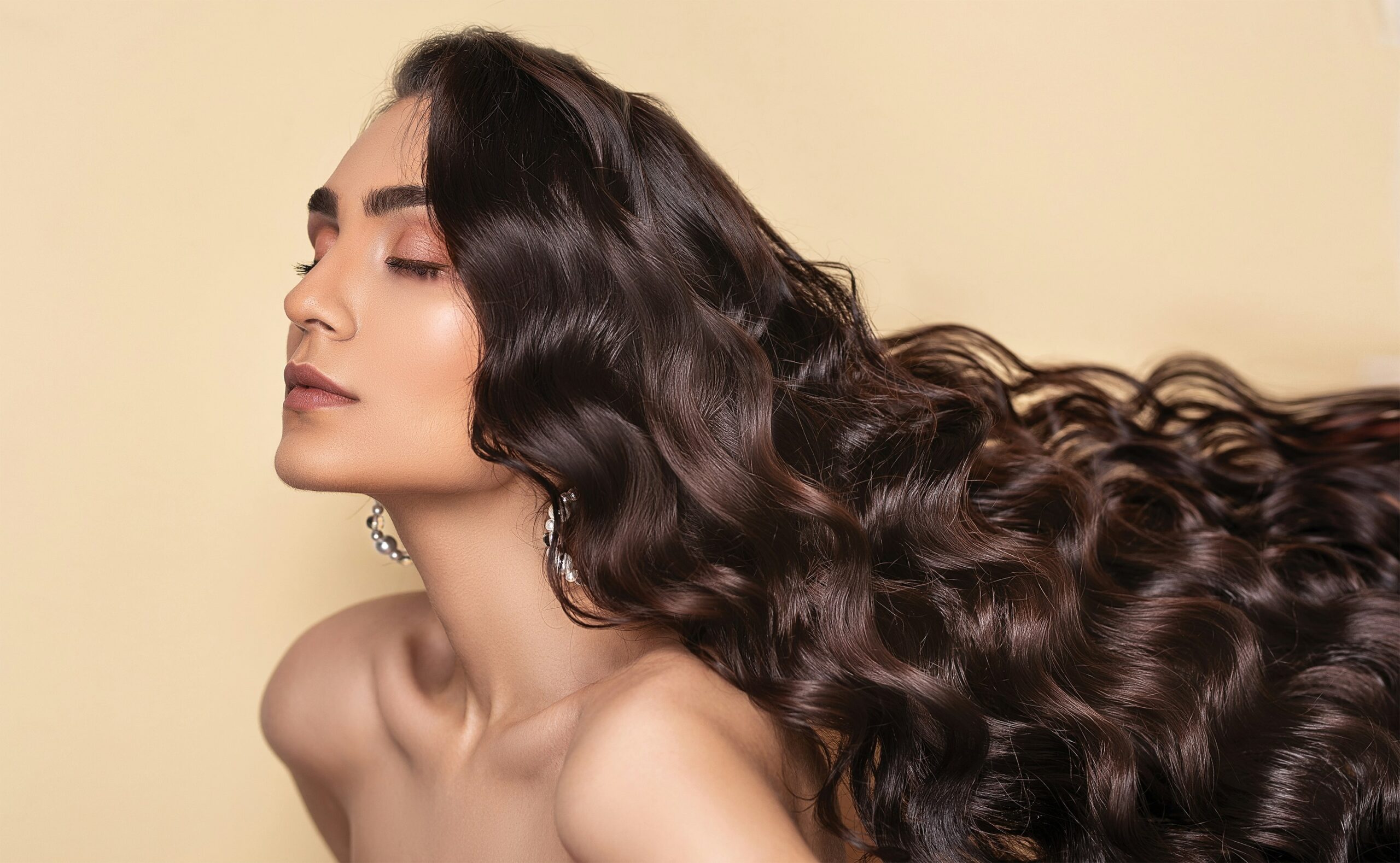 Zendaya wearing a sleek chignon hairstyle at the Met Gala.