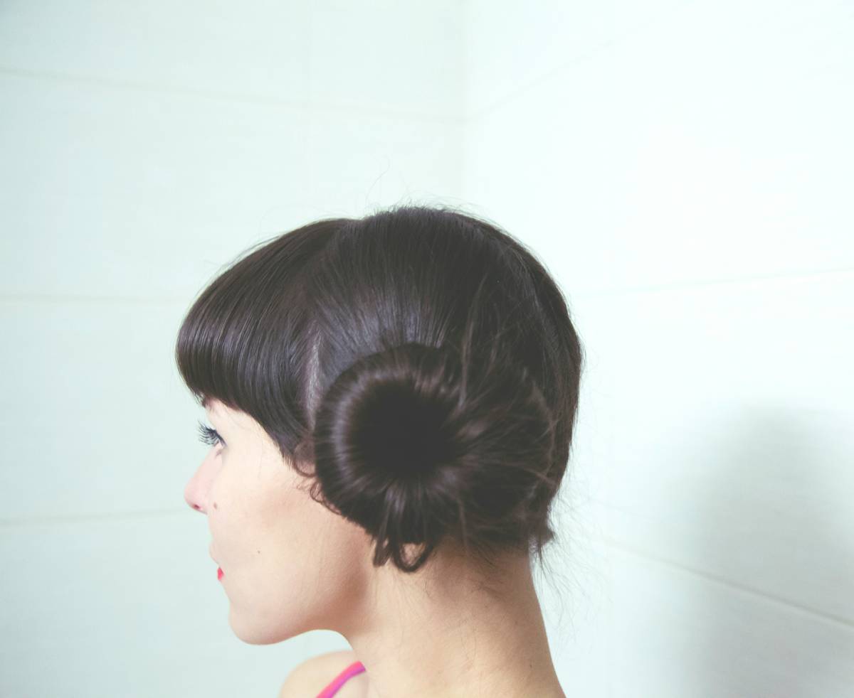 Step-by-step image showing how-to process of formal hair twists