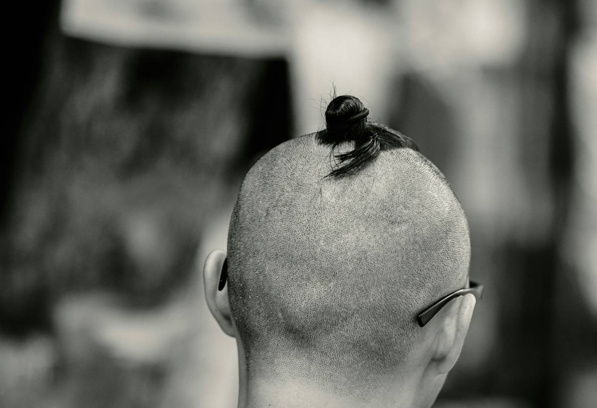 Three different office-friendly updo hairstyles side by side